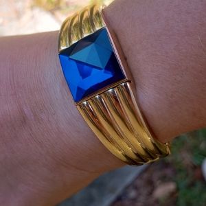 Unique Ladie's Goldtone simulated Sapphire watch. Working and like new condition